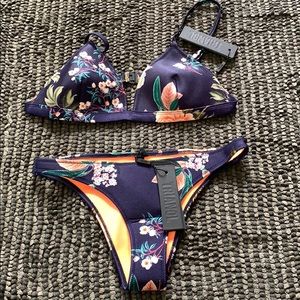 Triangl bathing suit.